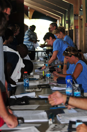 Volunteers register campers at the 2009 LFG Football Camp in Florida