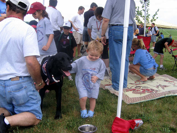 Therapy dogs bring smiles to kids at Family Fun Tent.JPG